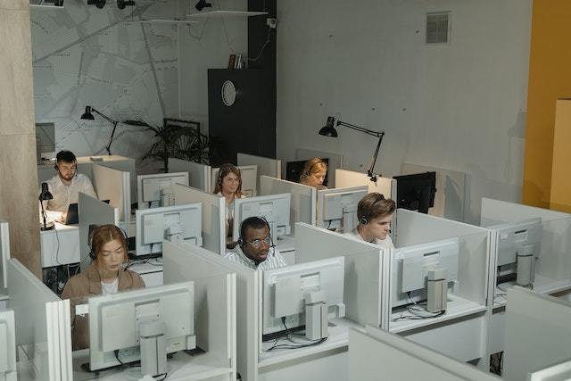 rows of people on computers